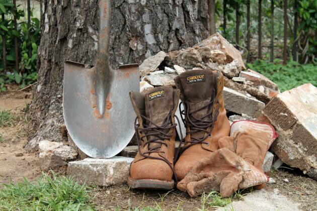 A shovel and other tools used to remove grass.