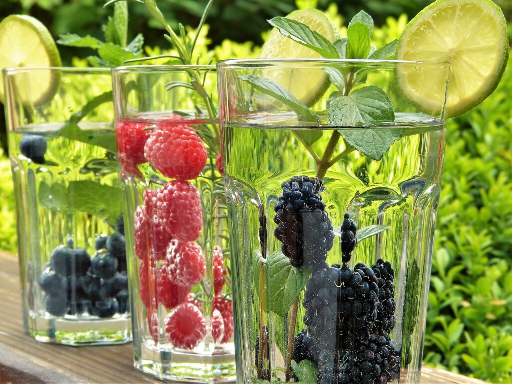 Create a simple outdoor entertaining space to enjoy good company and a refreshing drinks like these fruit-infused water options.
